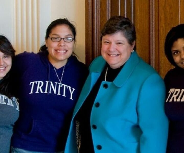 President Patricia McGuire with Trinity Washington University students